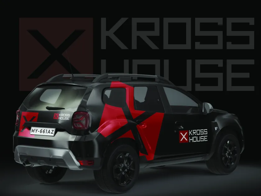 Kross House company car wrap in black and red
